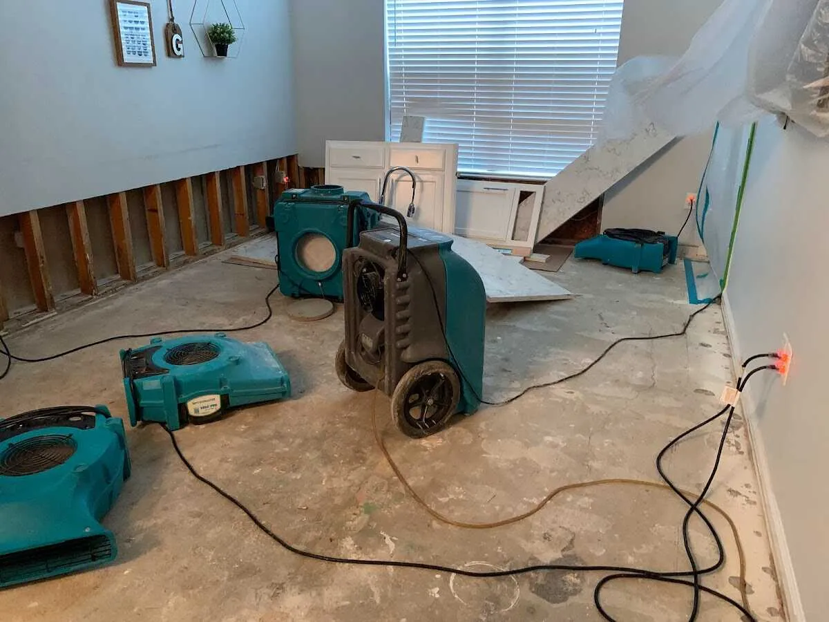 Dehumidifier in flood-cut room for Water Damage Restoration in Needham